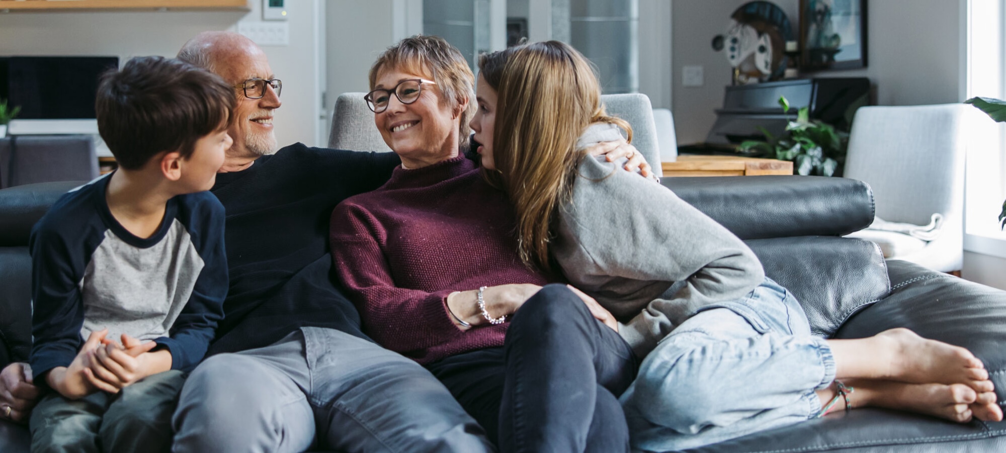 Older foster carer with two adolescents